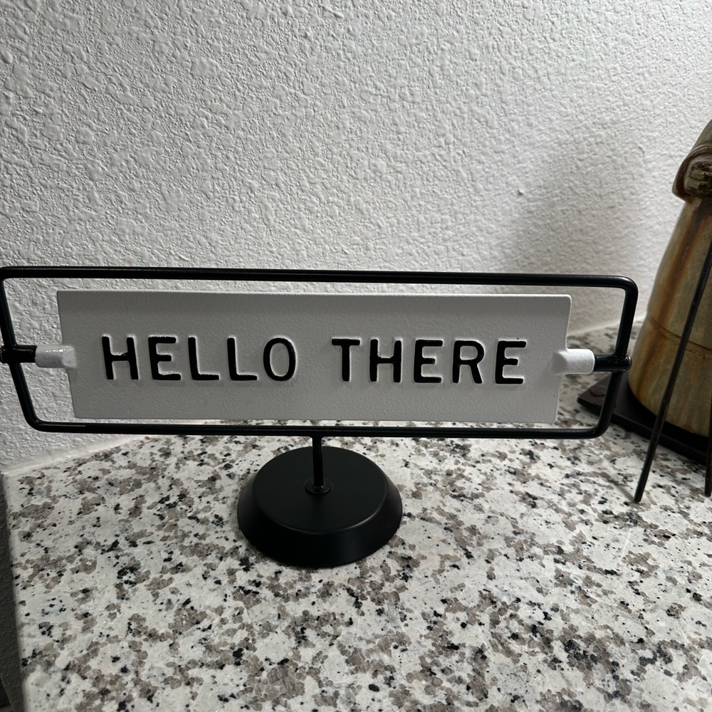 Black and White 'Hello There' Sign